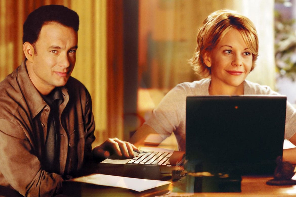 image extraite du film Vous avez un message représentant Meg Ryan et Tom Hanks devant leurs ordinateurs